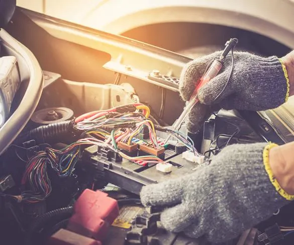 Mechanic working on electrics