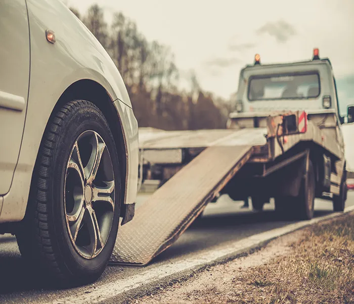 road_risks_car_loading_on_trailer